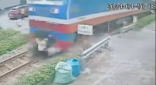 Vietnamese Woman Fails To Beat The Train