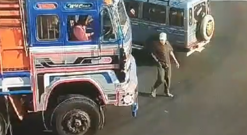 Old Man Heading To The Temple Meets The Truck