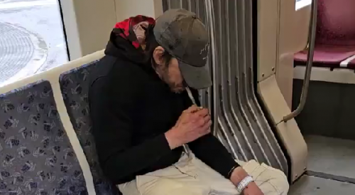 Man Taking Drugs On Toronto train