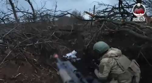 Russian assault storming a Ukrainian trench.