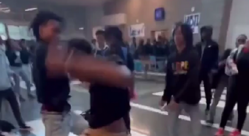 Dude projectiles vomit during school fight
