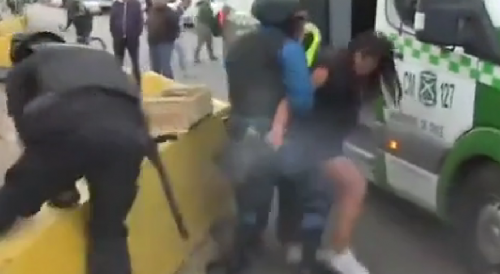 Vile Woman Shoots Cop with Cop's Gun On Chilean Live TV