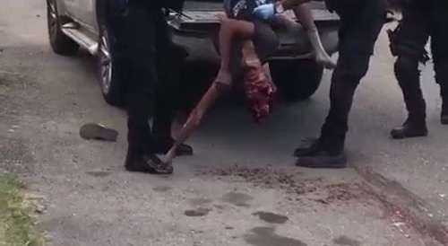 Classic: Gang members got their heads blasted while the jamaican police doing their worst job taking them on a truck