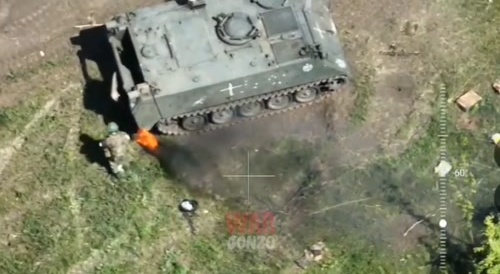 the fighter finishes off the surviving Ukrainian soldiers with grenades at point-blank range