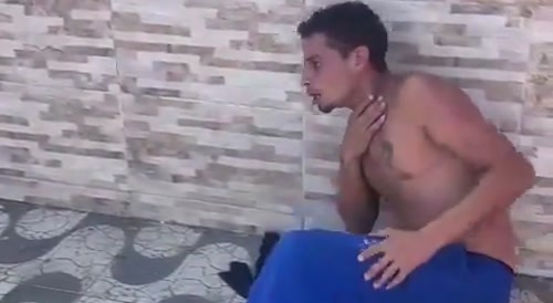 Brazilian thief recieving a massage from traffickers