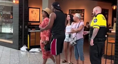 Angry Black Woman Smacks Security Guard