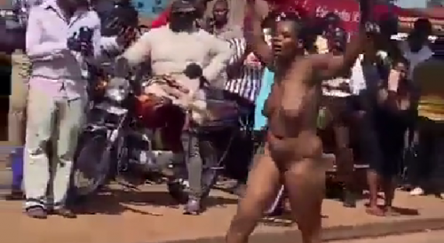 Woman Strips Naked On The Road In Public In Uganda