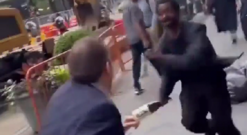 Suited Guy Takes a Swing at a Homeless Man and Regrets It