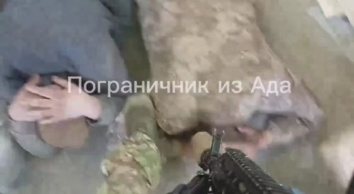 Ukranian forces captured by Russian soldiers.