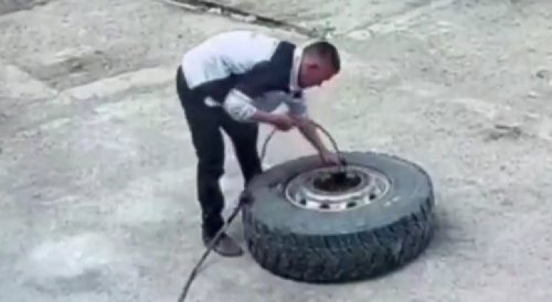 Uzbekistan: Trucker Knocked Out By Tire Explosion