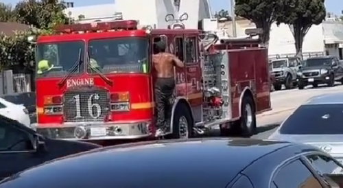 Intoxicated Man Jumps On Fire Truck In LA