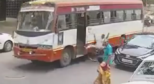 Man Using Phone While Cycling Crushed To Death By Bus