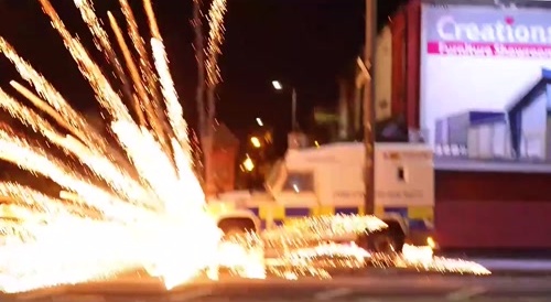 Police were attacked with petrol bombs last night as disorder broke out in Belfast