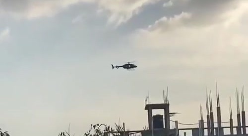 Bangladeshi police shooting from the helicopter in student protest