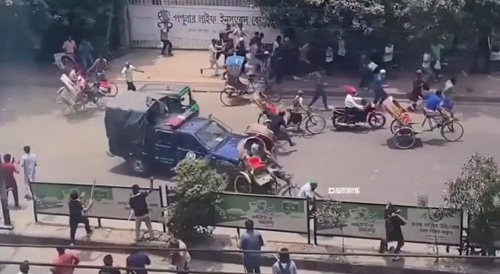 Bangladeshi Police Plow Through Rickshaws to Escape Protestors