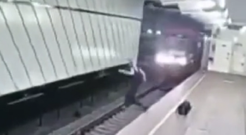 Crazy Moscow Girl Jumps On Subway Tracks, Survives !