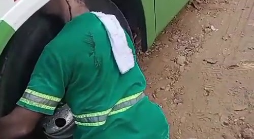 Brazilian Gets Head Smooshed While Working On A Tire