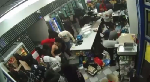Mob ravages California mini-mart during flash robbery