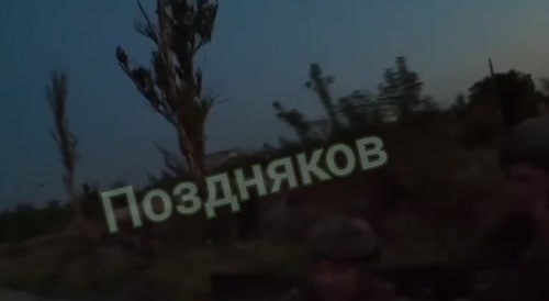 Russian Soldier Shoots Down A Drone Following His Truck.