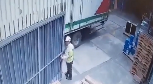 Stupid Idiot gets Hand Crushed by Truck