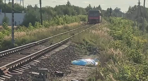 Careless Russian Biker Killed By Train