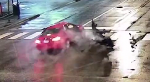 Biker dies after running red light into car in Chicago