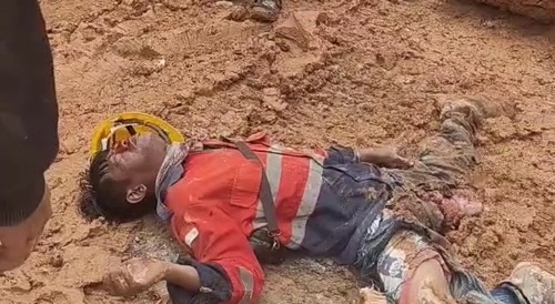 Worker in agony after getting run over by Excavator