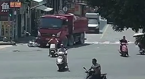 Moped Rider Ran Over By Red Dump Truck