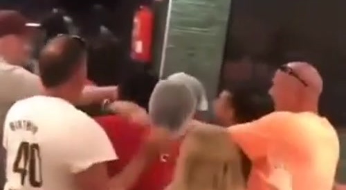 Overweight gringos throwing hands in a KFC