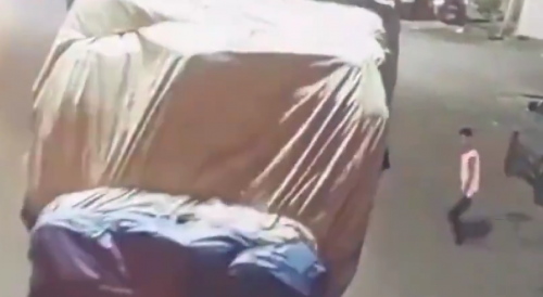 Man Throws Himself Under Overloaded truck