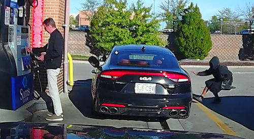 Missouri car thief caught on camera making off with car as owner pumped gas