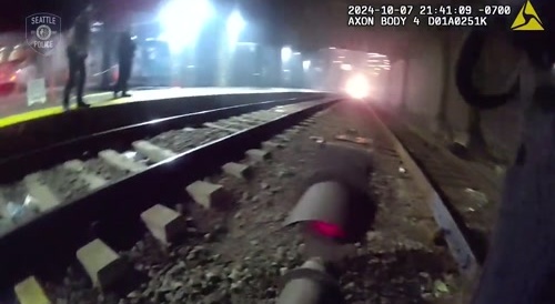 Brave Seattle Cop Saves Man From Moving Train