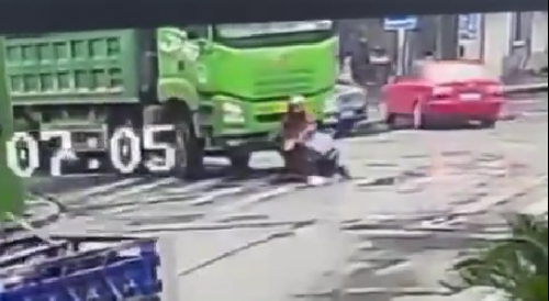 Moped Rider Crushed By Green Truck In China