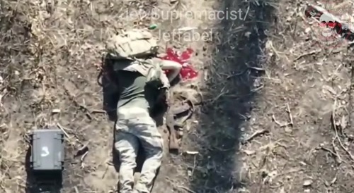 Ukrainian soldiers abandon their comrade.