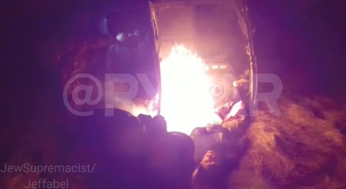 Russian special forces ambush Ukrainian vehicle and burn bodies.