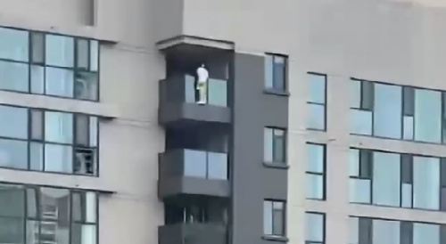 Man Jumps From A Tall Building In China