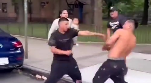 Latino Men Throwing Fists In New York