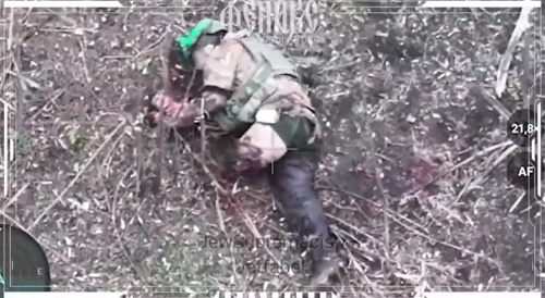 Ukrainian terrorist suffering without an arm and a leg.