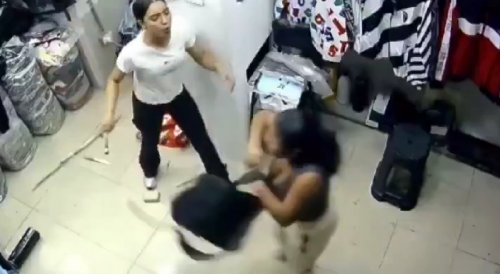 Shoplifting Woman Clubbed By Clothes Store Employee