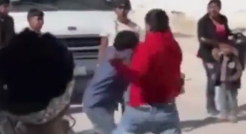 Mexican Band Plays "Rocky" during street fight