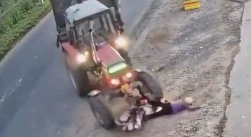 Viet Moped Rider Ran Over By Tractor