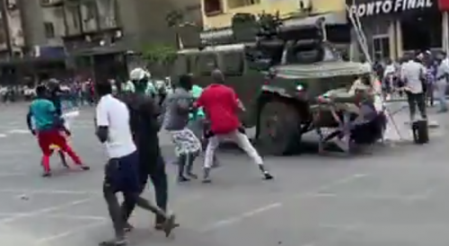 Woman Protester Crushed By Mozambique Police Car