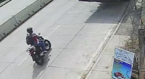 Biker Plows Into Parked truck In Honduras