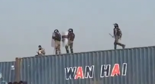 Protester Thrown Off Container By Pakistani Police