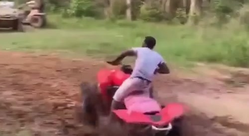 ATV rider shows proper way to dismount