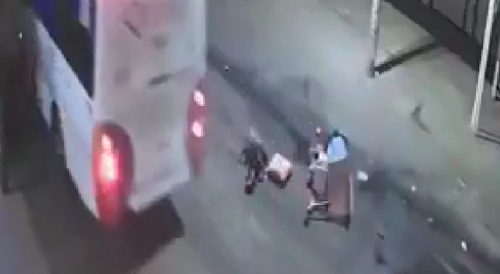 Garbage collector is run over by a passenger truck