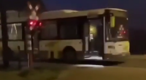 Bus Demolished by Train In Belgium