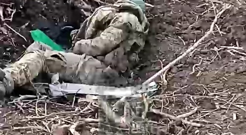 The trenches are littered with corpses of Ukrainians, accompanied by calm music.