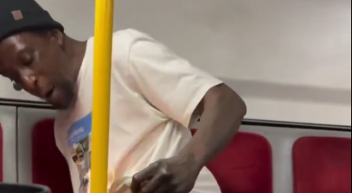 Brotha burns his shirt on bus