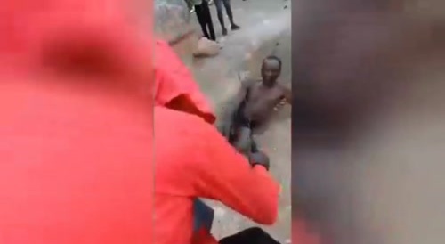 A man accused of rape is beaten and set on fire (Probably Haiti)